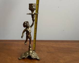 C105 - $18. Single Brass Candleholder. 