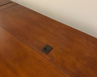 C111 - $1750. Sligh TV Lift Media Cabinet with Remote. Moves in 3 pieces. Each side piece is 24" wide x 27" deep x 34" tall. Center piece is 5' long x 28" deep x 34" tall. 