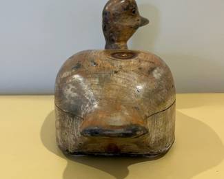 C17 - $125. Unsigned *old* duck decoy with glass eyes and swivel head. Measures 12" x 4.75" wide x 7.25" tall. 