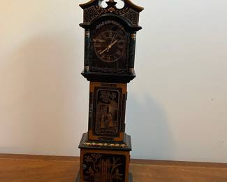 C33 - $30. Battery Powered Desk Clock/Jewelry Box.  Measures 6.25" wide x 4" deep x 23.5" tall. Middle & Bottom section open with felt lining. 