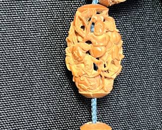 C113 - $2000. 19th Century Chinese Heido Carved Fruit Pits on Bracelet. Qing Dynasty 1850s. 12 Beads. 