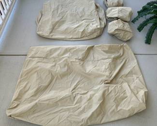 C120 - $100. Cover Mates. 4 Chair Covers  aprox 36" wide 1 Loveseat Cover aprox 56" wide. Covermates brand. Draw string bottoms with mesh back. Heavy Duty - like new condition. 