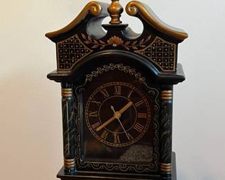 C33 - $30. Battery Powered Desk Clock/Jewelry Box.  Measures 6.25" wide x 4" deep x 23.5" tall. Middle & Bottom section open with felt lining. 