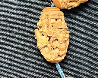 C113 - $2000. 19th Century Chinese Heido Carved Fruit Pits on Bracelet. Qing Dynasty 1850s. 12 Beads. 