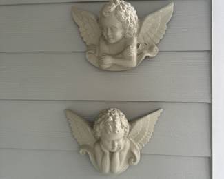 C108 - $50 PAIR. Both have repair to wings. Heavy pottery wall hangings.  