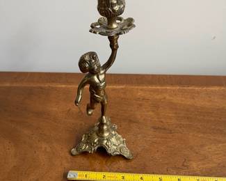C105 - $18. Single Brass Candleholder. 