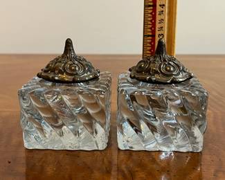 C19 - $25 PAIR. Thick glass inkwells with lids. No chips noted. Glass is 2.5" square x 3" tall with lid. 