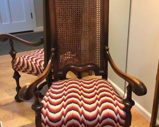 Highback chair with carved details & fun needlepoint seat (58” high at back, 28” wide at arms)