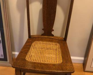Old oak chair with cane seat