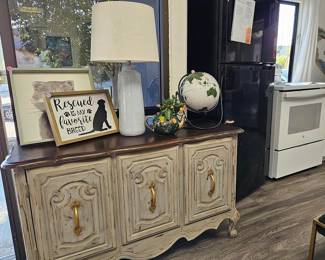 Used console table with lots of storage underneath and more decor.