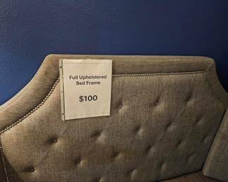 Full bed frame with padded headboard