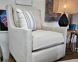 2 Upholstered swivel accent chairs