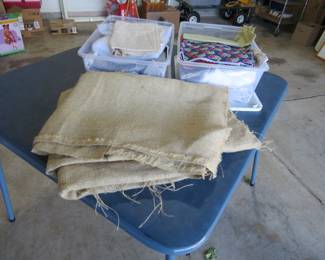 Stacks of sewing fabric and burlap.