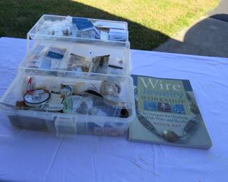 Lots of crafing supplies. Pictured: jewelry making supplies and book.