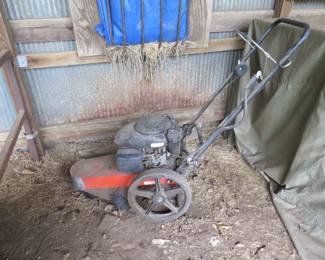 Kohler Walk-Behind trimmer mower.