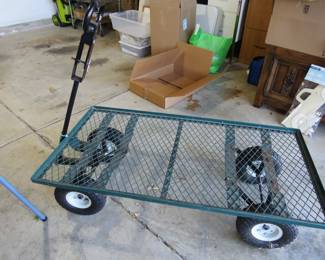 Metal, green garden wagon.