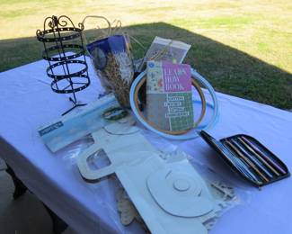 Crafting supplies, crochet book, decor and complete needle set.