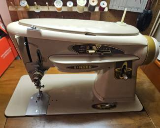 $60 Singer sewing machine with cabinet