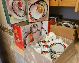 $75- 12+++ Deck the Halls Christmas four-piece place settings, serving dishes, drinkware.