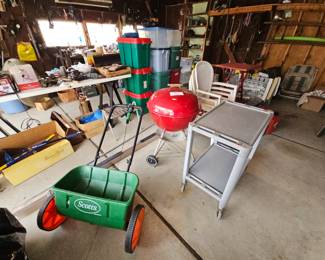 $10 Spreader, $45 red Weber charcoal grill, $20 Rubbermaid cart, $3 ea. 4 white chairs