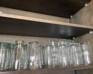Shelf of Clear Glass 8 oz Drinking Glasses