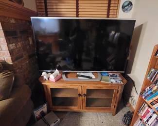 Sharp Aquos Television - works good!  Glass front wood TV stand
