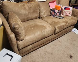 Loveseat with pullout bed (in basement)