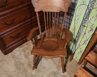 Vintage Child's wood rocker with leather seat 