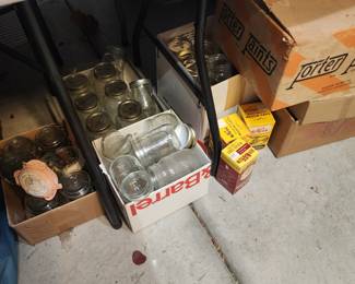 Several boxes of canning jars and lids