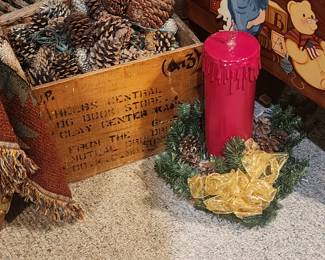 Lighted pine cone box and candle