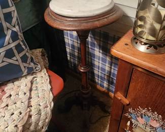 Small circular table /plant stand with marble top