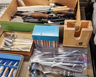 Knives, Bagel slicer, recipe box, serated spoons, large spiral handled serving spoon/ fork set. 