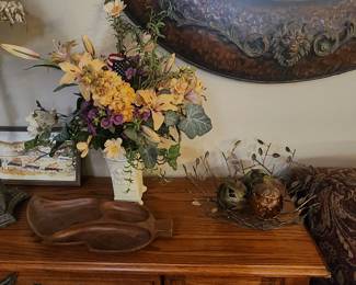 Metal vine tray with  decorative spheres,  artificial floral arrangement in vase, and leaf shaped wood tray