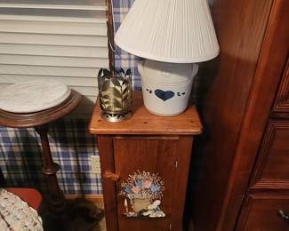 Bunny themed cabinet with crock-style lamp