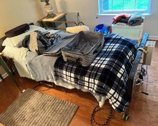 Twin size hospital bed. $50.00 or BO