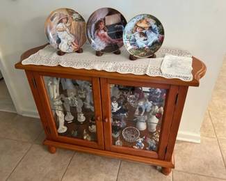 Small glass and wood display cabinet. Items inside are not included. $50.00 or BO