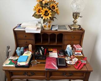 Small wood secretary desk. $50 or best offer. Items on the desk are not included.
