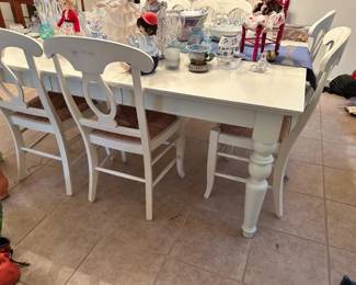 Pottery Barn dining table. Two leaves. Large! 8 chairs. Great condition. $250.00 or best offer.