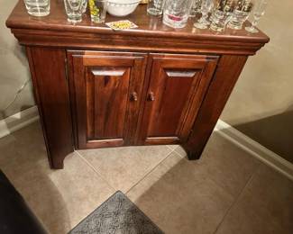 Small wood cabinet. End table, bar storage, etc. Great condition. $50.00 or best offer.