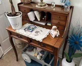 Small wood secretary desk. $50 or best offer. Items on the desk are not included.
