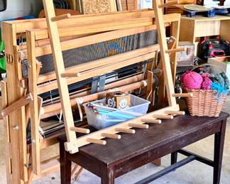 LOOM and yarn and all the other fun stuff that goes with this. We also have a small STORE of FABRIC. Bolt after BOLT and so many amazing remenants...if you are craffy and need to recover something - do not miss this