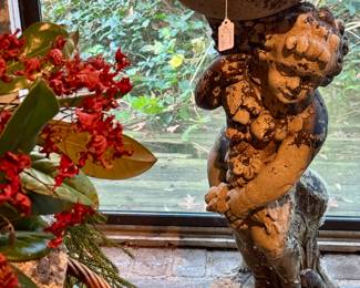 Cherubs and cement statues/planters galore