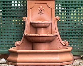 Fountain captures delightful private yard. It is not in sale. 