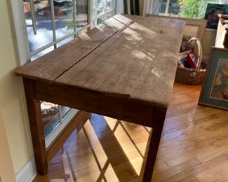 Several rustic farm tables