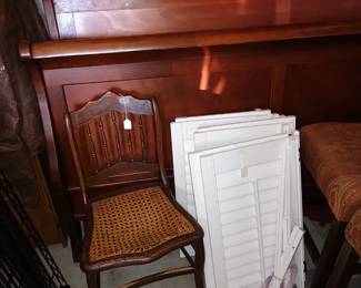 antique cane seat chair, King sleigh  bed, shutters