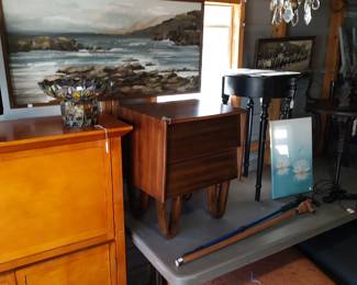 accent tables, crystal chandelier, canes, footstool