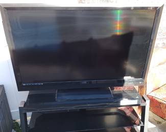 Vizio 55" flatscreen  TV,  metal/glass TV stand