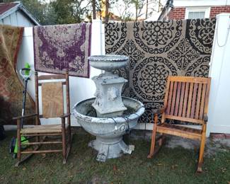 area rugs, cast aluminum lionhead fountain, wood porch rockers