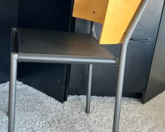 Side View of the Phillipe Starck (French, B. 1949), "Lila Hunter" Chair with Black Leather Seat.