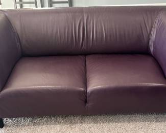 Fabulous Italian Leather 2 - Cushion Loveseat in Eggplant. (Two Available) 68"w x 34"d x 28"h.